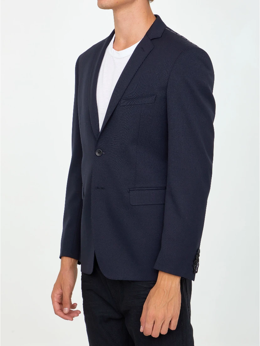 Single-breasted jacket made of blue wool gabardine