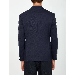 Single-breasted jacket made of blue wool gabardine