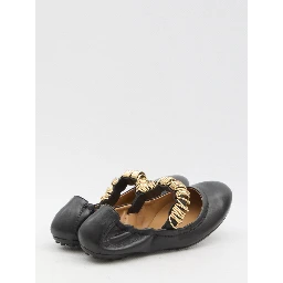 Ballet flats with eyelets