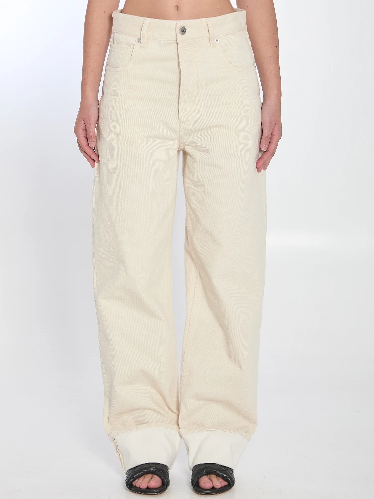 Turned up jeans