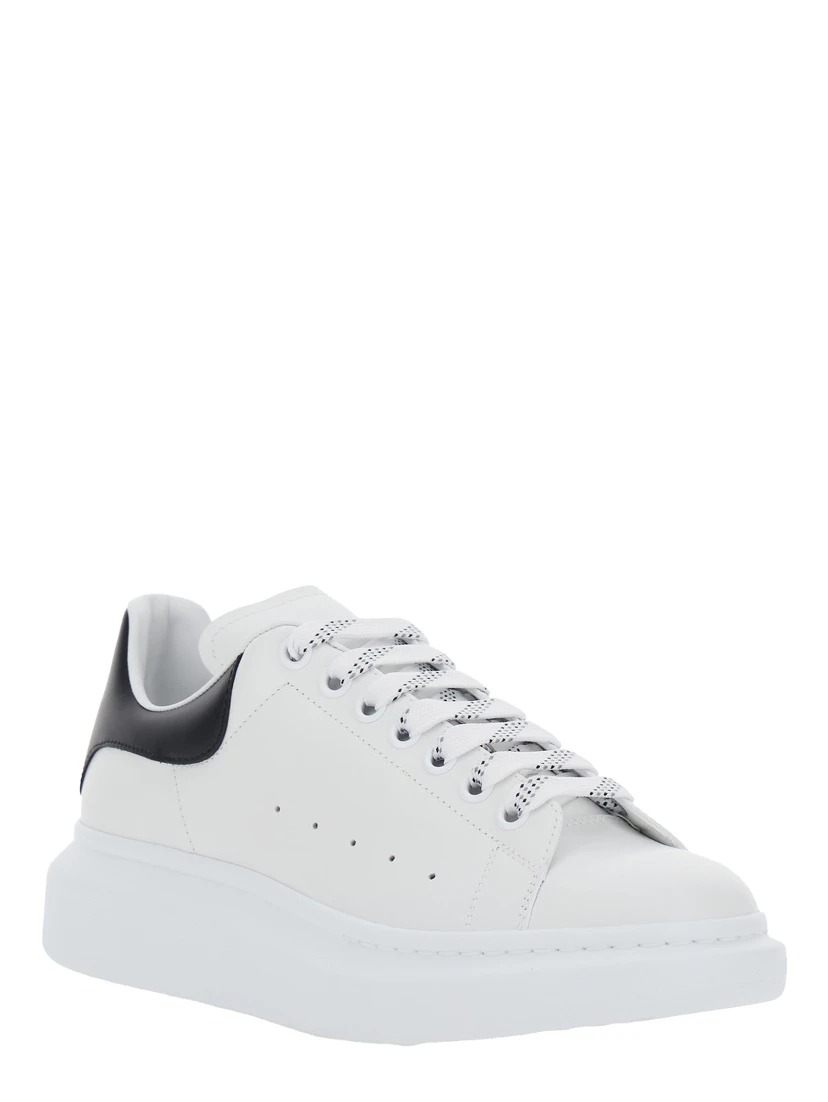 Black and White Low Top Sneakers with Logo Lettering on Tongue and Contrasting Heel in Leather Man