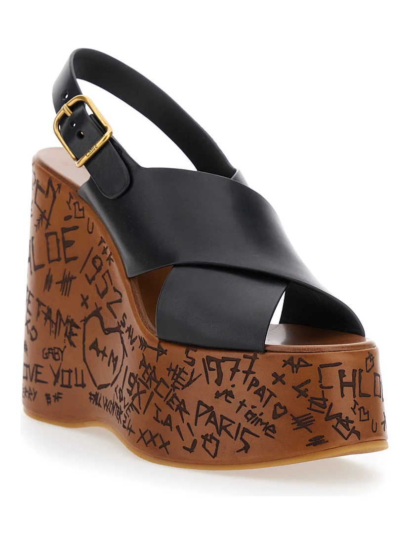 Maxime Black Wedges with High Embossed High Wedge Heel and Crossover Strap on the Toe in Leather Womam