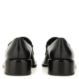 MOCCASIN WITH CLAMP