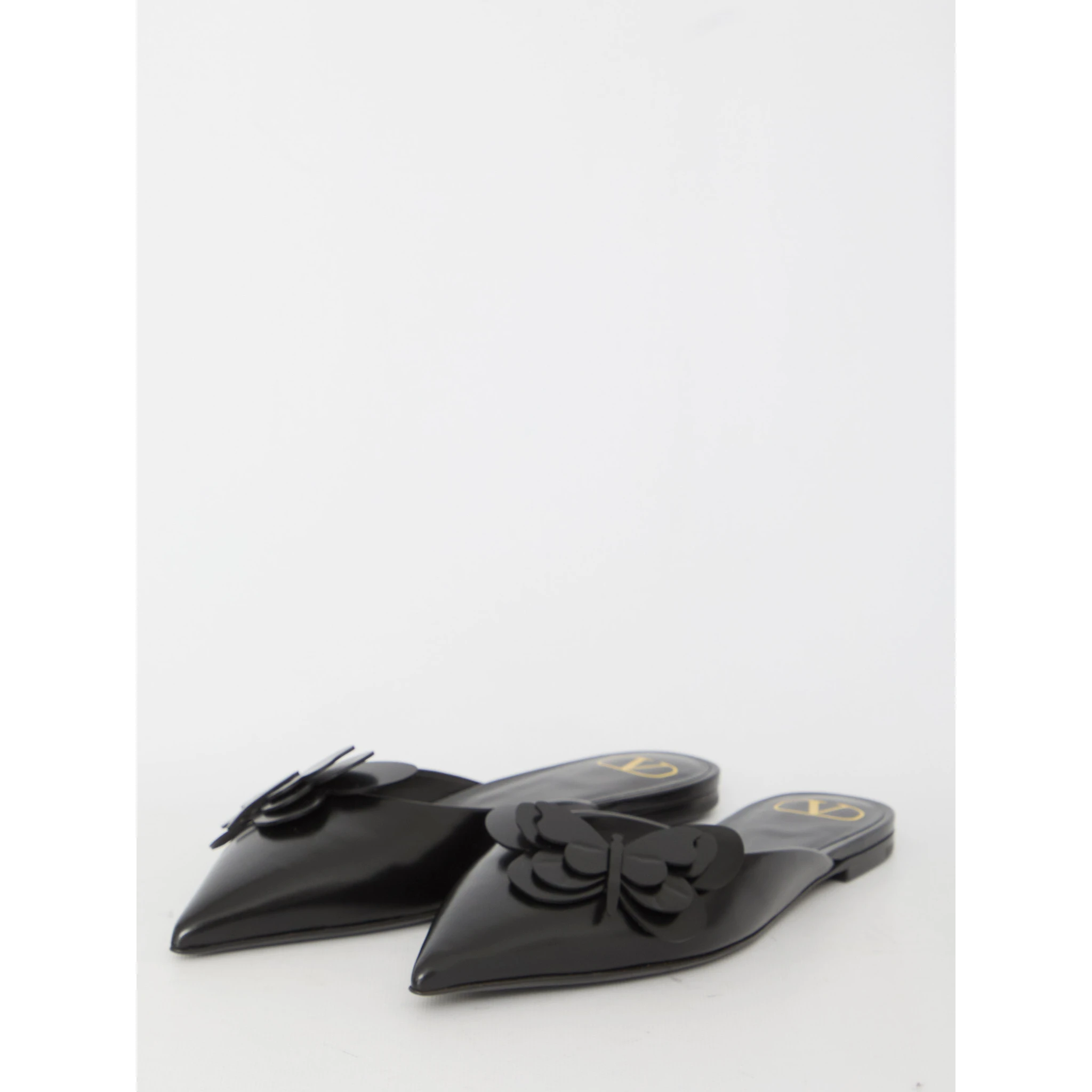 Flat mules in leather