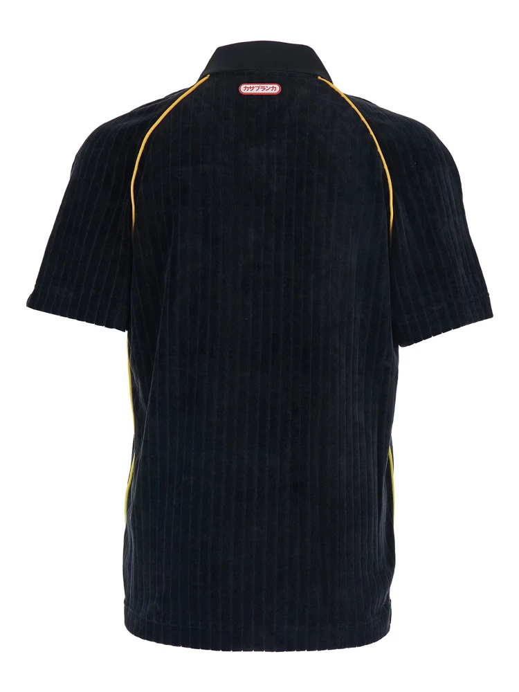 Black Polo Shirt with Classic Collar and Logo Embroidery on the Front in Corduroy Man alternative