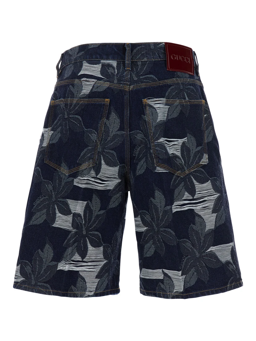 Blue Bermuda Shorts with All-Over Floral Embroidery and Logo Patch on the Back in Denim Man