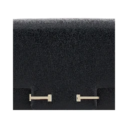 Black Crossbody Bag with Adjustable Shoulder Strap and T Plaque Closure in Grained Leather Woman