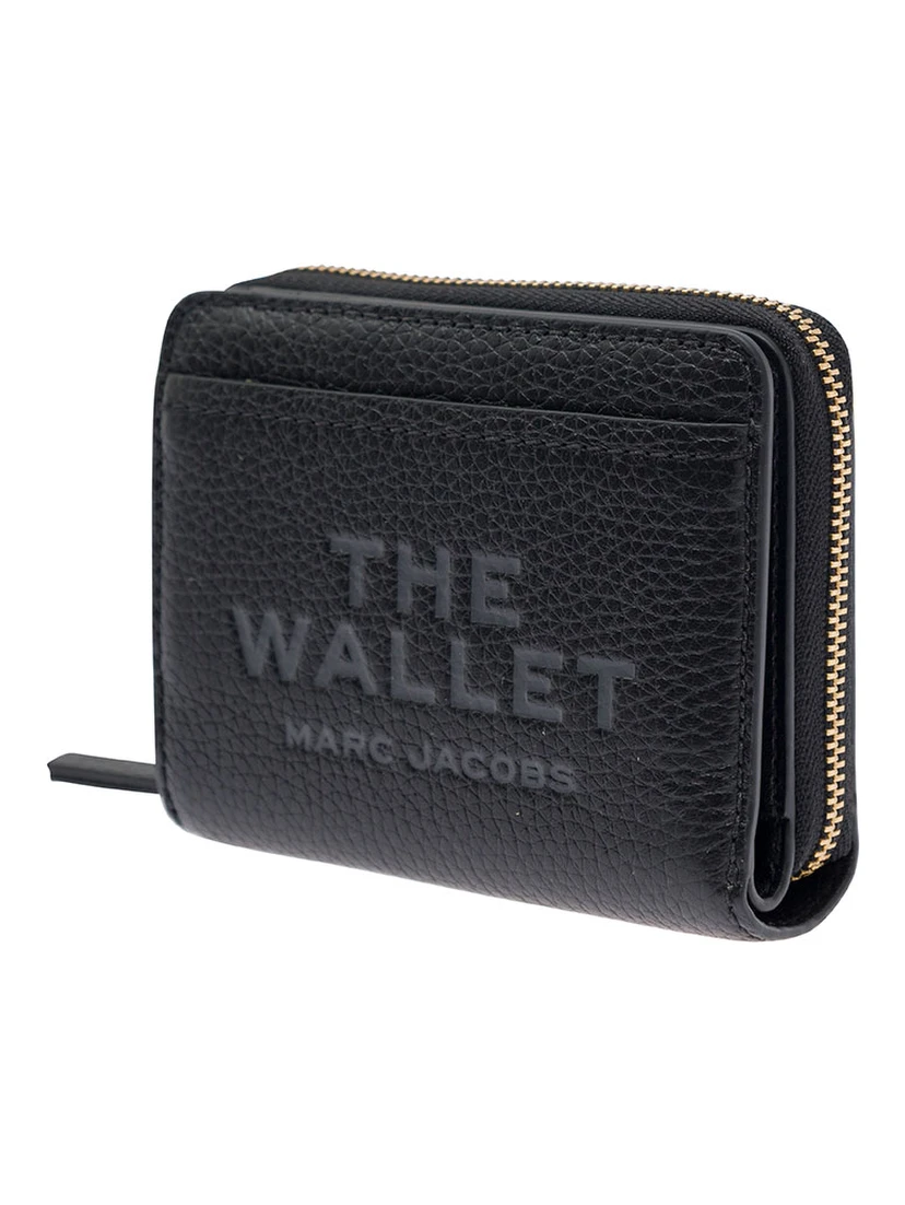The Mini Black Wallet with Engraved Logo on the Front in Hammered Leather Woman