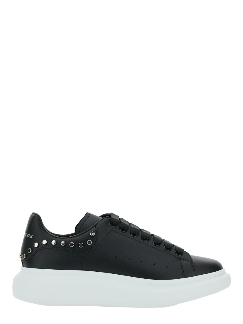 Black Low Top Sneakers with Stud Embellishments in Leather Man
