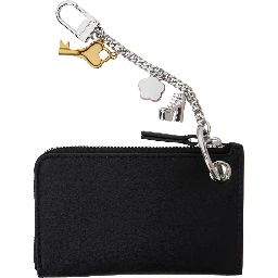 The Coin Purse Charm Black Keychain with Logo Lettering on the Front and Charm Embellishments in Grained Leather Woman
