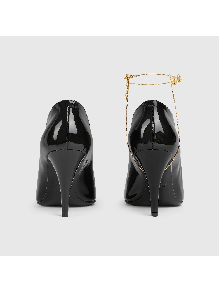 Leather décolletté pumps with jewel alternative