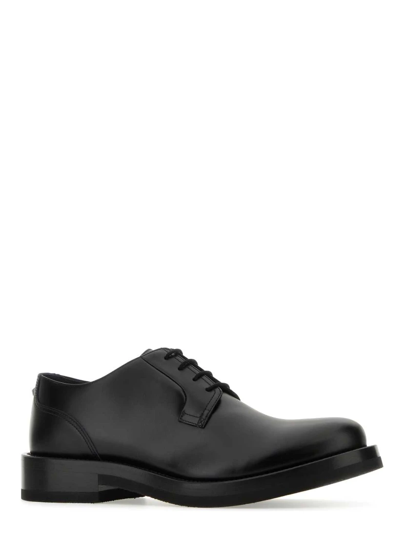 SCARPE STRINGATE