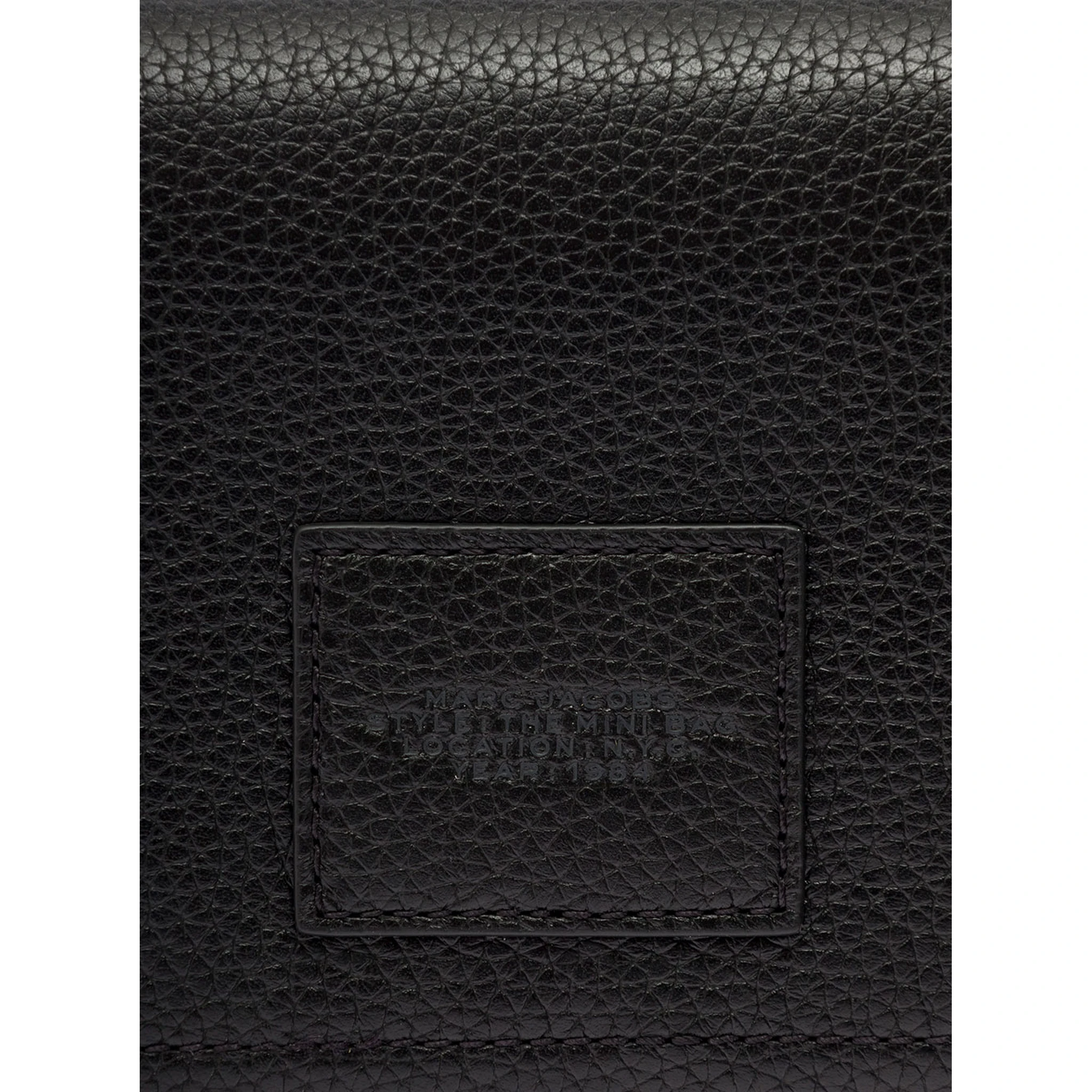 Mini Black Crossbody Bag with Engraved Logo in Hammered Leather Woman