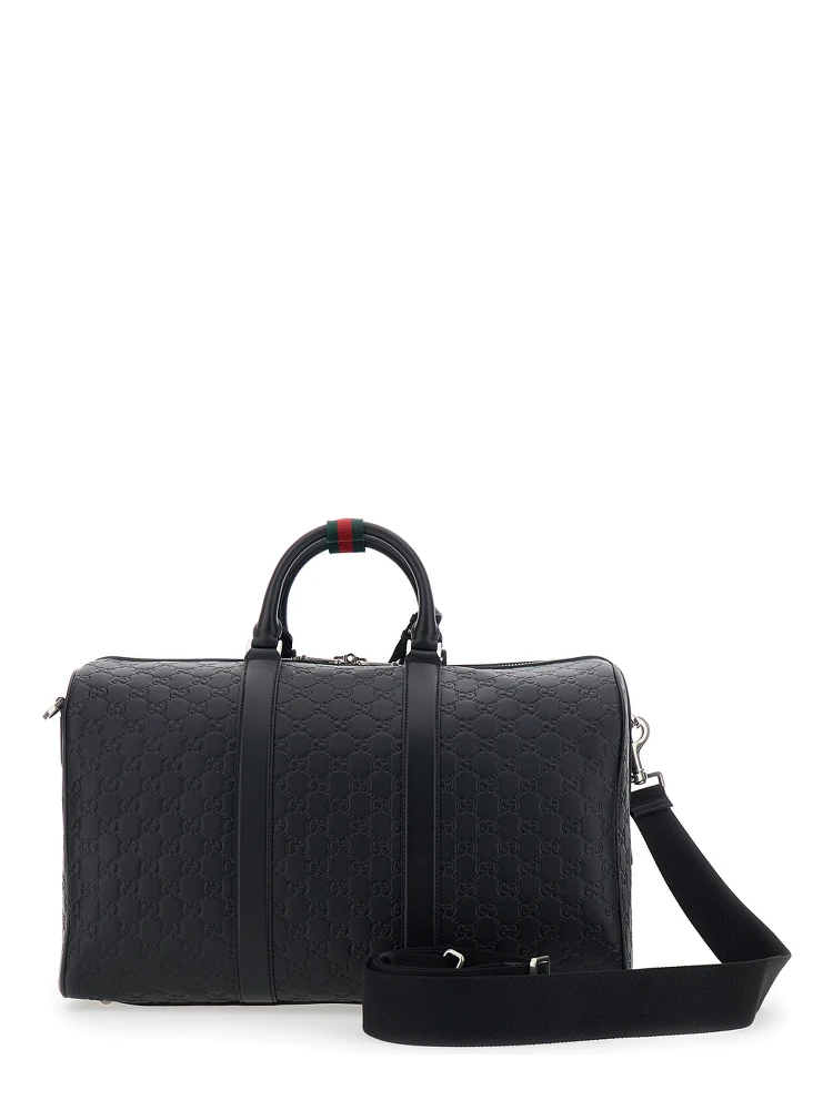 Emblem Black Suitcase with Adjustable and Removable Shoulder Strap and All-Over Embossed GG Motif in Leather Man alternative