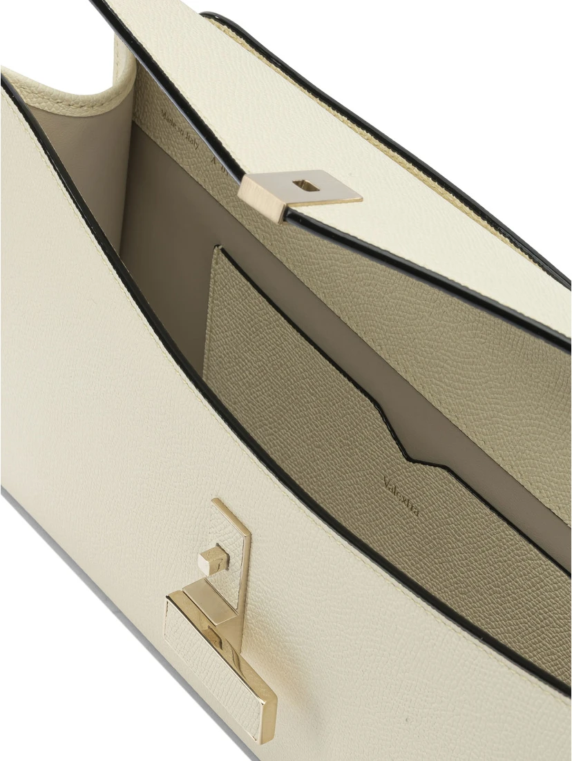 "Iside" leather clutch bag