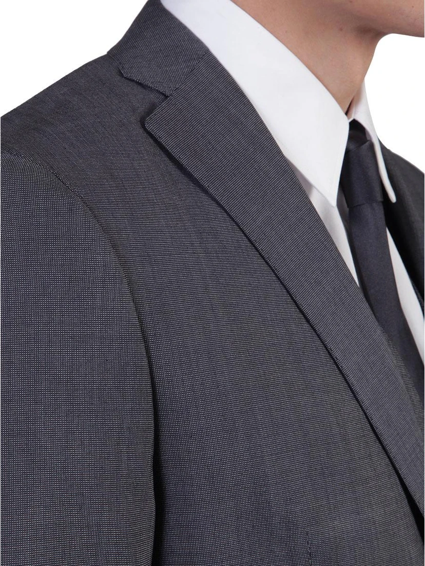 Gray three-piece suit