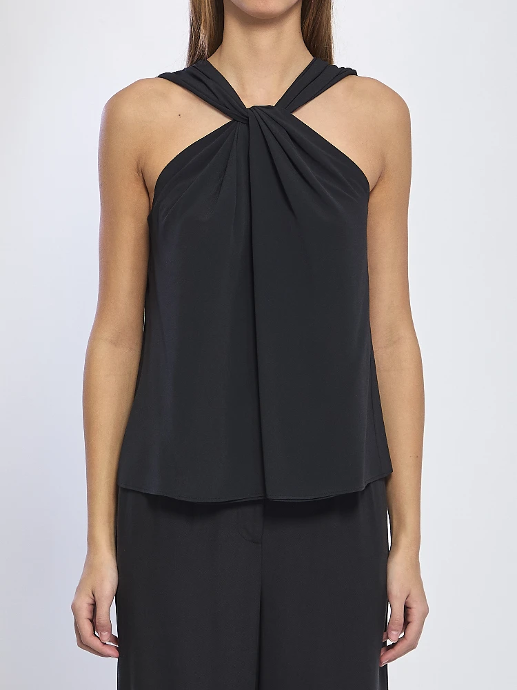 Crossed knot top
