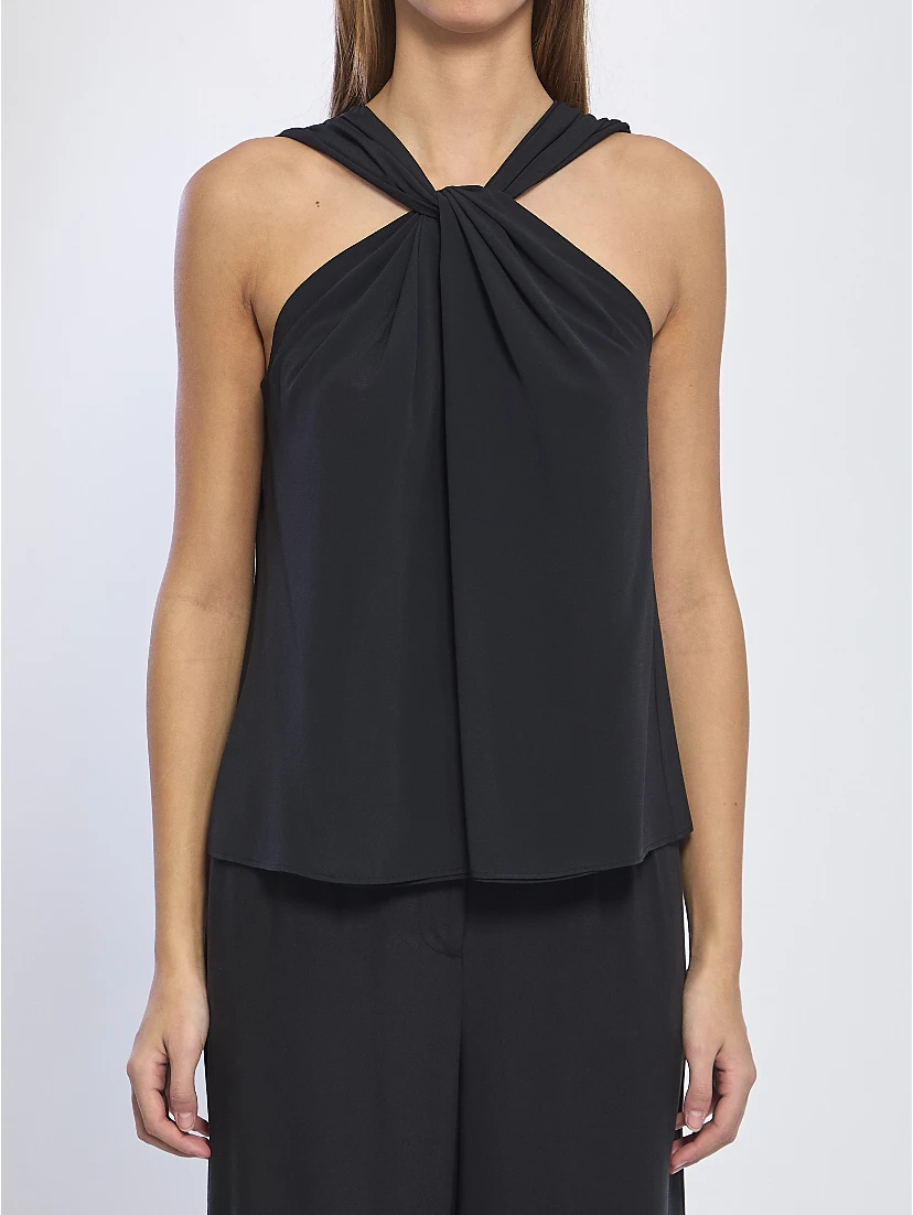 Crossed knot top
