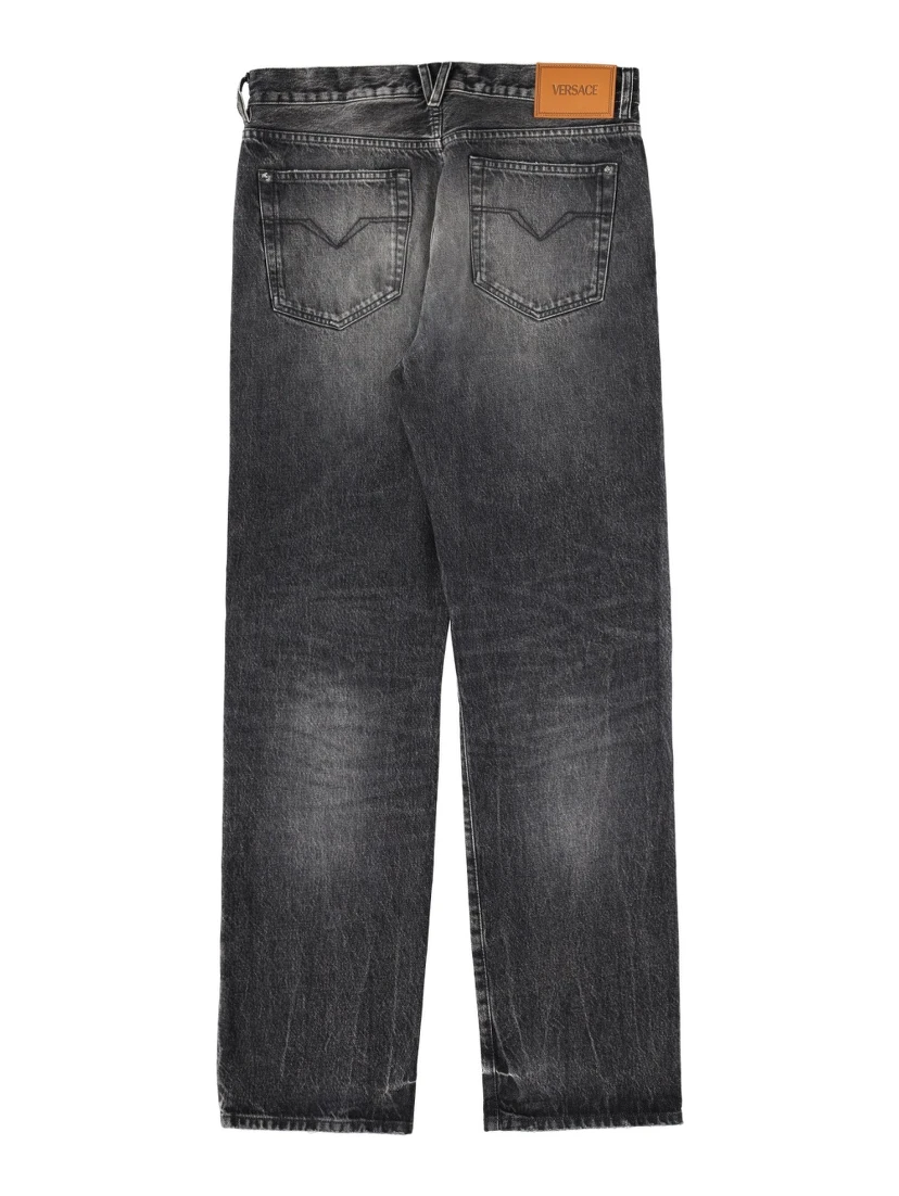 JEANS WITH "MEDUSA" DETAIL