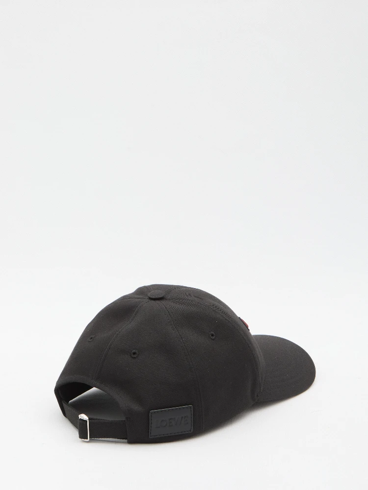Cap with appliqué alternative