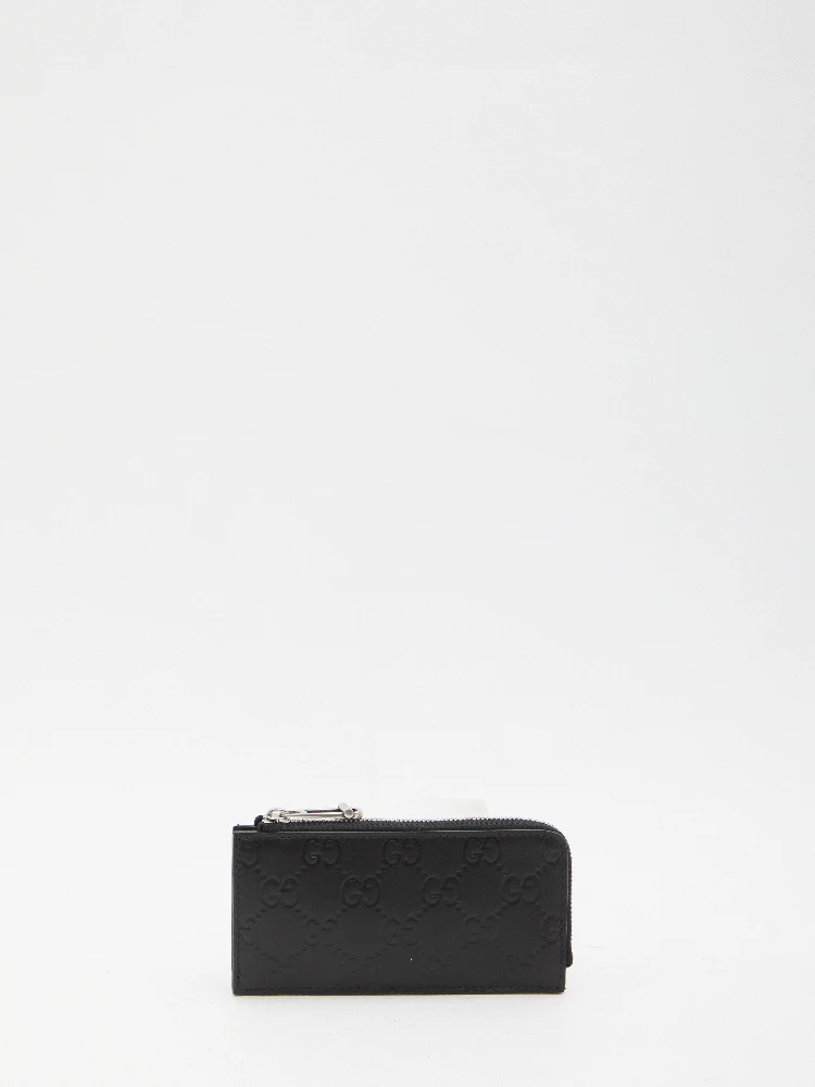 Card holder with zip