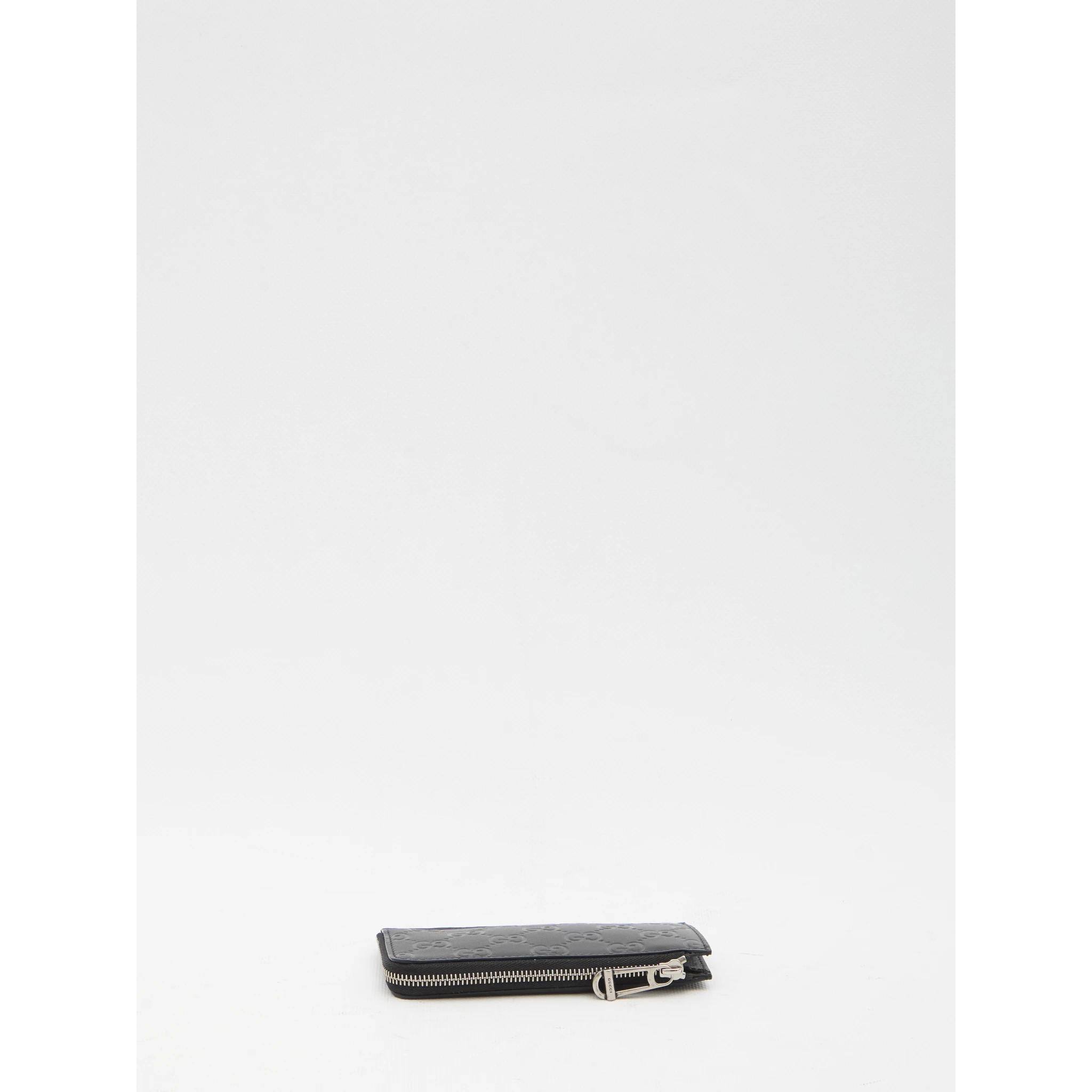 Card holder with zip
