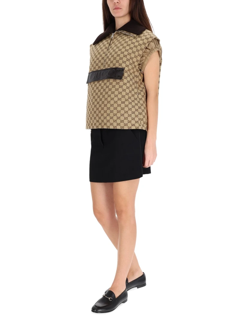 VEST WITH LEATHER LABEL