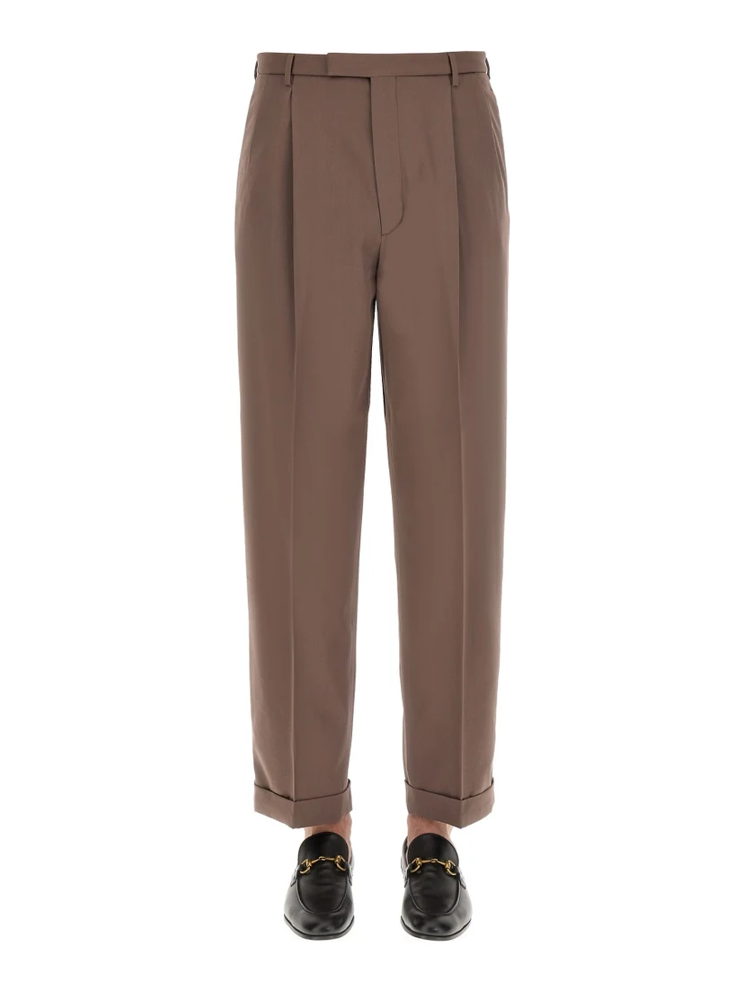 PANTS WITH GUCCI LABEL